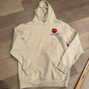 COCA COLA WORLD OF COKE HOODIE SIZE SMALL NWOT